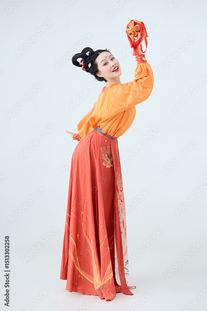 Beautiful dancers wearing ancient Tang Dynasty costumes and makeup performing classical dance Beautiful dancers wearing ancient Tang Dynasty costumes and makeup performing classical dance