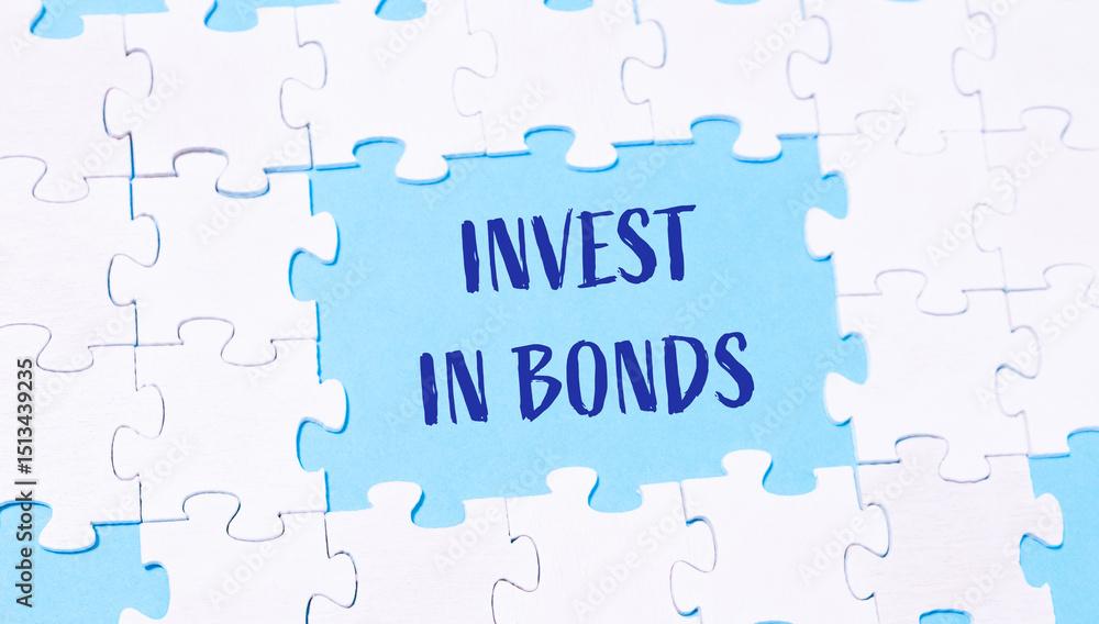 Fototapeta premium Jigsaw puzzle with the words invest in bonds written in blue
