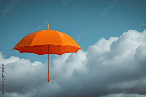 Bright Orange Umbrella Against a Cloudy Blue Sky Backdrop for Protection