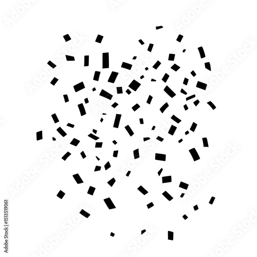 Colorful confetti pieces scattered in a lively celebration atmosphere during a daytime event or party setting