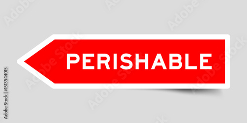 Red color arrow shape sticker label with word perishable on gray background