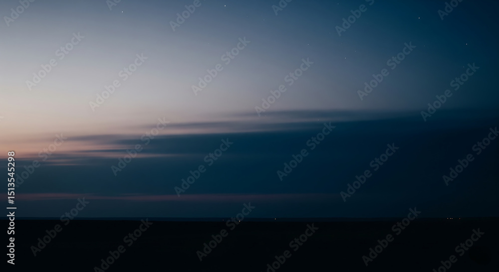 Fototapeta premium Tranquil Twilight Sky Background with Fading Blue Hues and Distant Horizon, Capturing the Peaceful Transition from Day to Night in a Natural Landscape