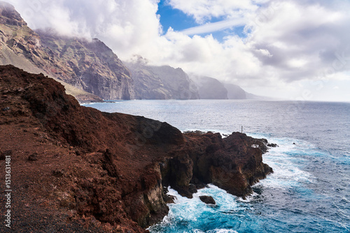 View of the fjords. A pleasant landscape with the ocean and large rocks