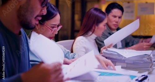 Overloaded office workers struggle with paperwork and deadlines in a late-night scene. Multicultural business team faces stress, frustration, and pressure in high-stakes work environment.