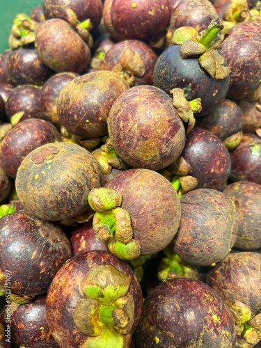 Fresh Purple Mangosteen Fruits at Local Market