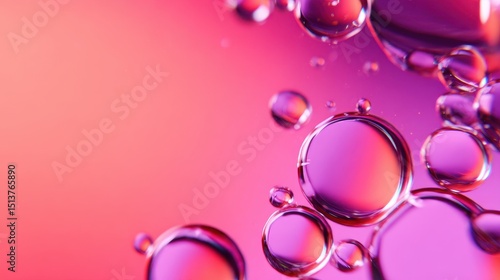Colorful water droplets reflecting light against a vibrant pink and purple background