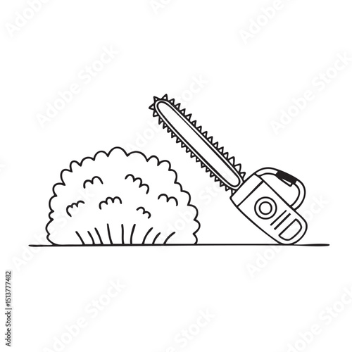 A hedge trimmer lying next to a trimmed bush