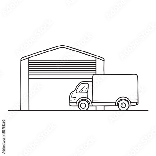 A truck parked behind a warehouse gate