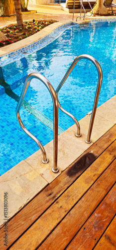 Summer, luxury hotel pool. Luxury rooms, palm trees and summer season. Background
