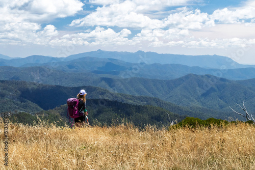 Solo Female Hiker on Razorback Walking Track, Mount Feathertop – Scenic Alpine Trail in Victoria, Australia