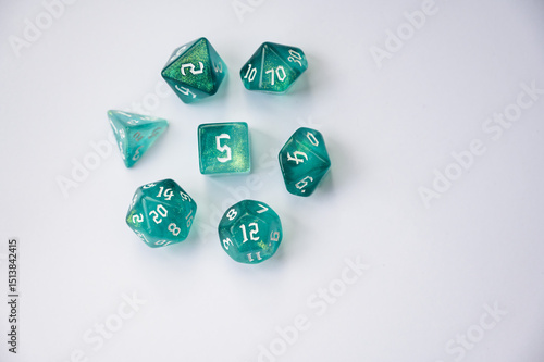 Set of blue dice for role-playing games on a white background. Multi-sided dice (d4, d6, d8, d10, d12 and d20) for fantasy games.
