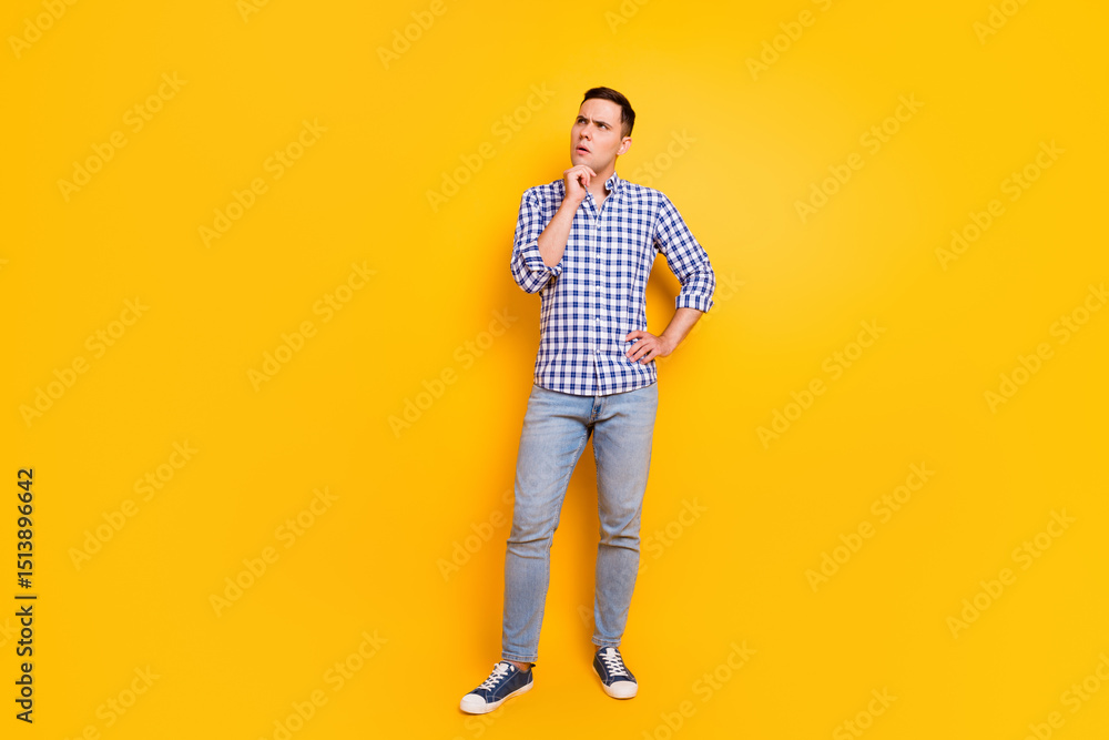 Full body photo of funny attractive guy not trust bad idea overthinking isolated yellow color background Full body photo of funny attractive guy not trust bad idea overthinking isolated yellow color background