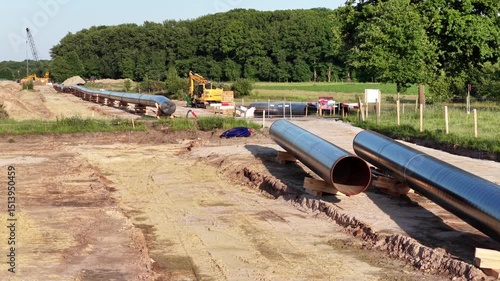 Wallpaper Mural Construction process of gas pipeline in rural area showcases advanced techniques and collaboration among workers Torontodigital.ca