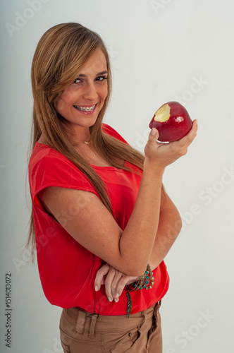 woman holding apple