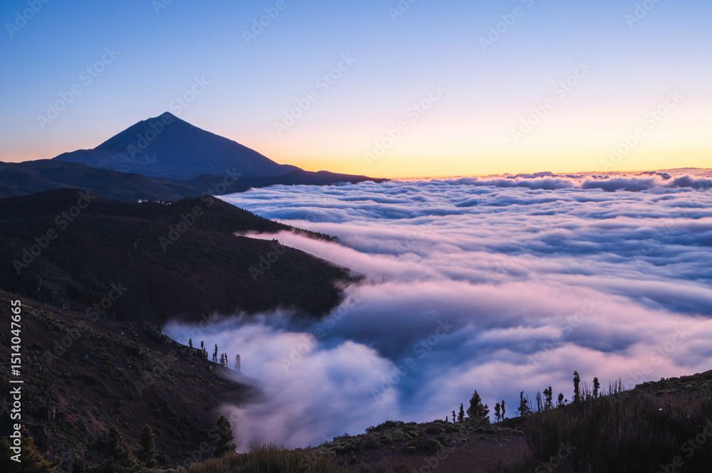 Fototapeta premium Stunning sunset above the clouds in the Teide volcano national park, Tenerife, Canary Islands, Spain