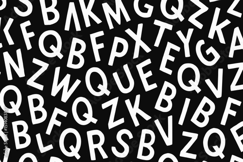 Abstract letter pattern. Seamless typography background. Randomly scattered alphabet. White uppercase characters on black. Monochrome design. Typographic texture. Education. Print. Web. Graphic asset.