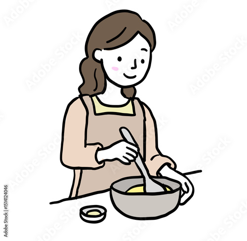 エプロンをして料理をする女性