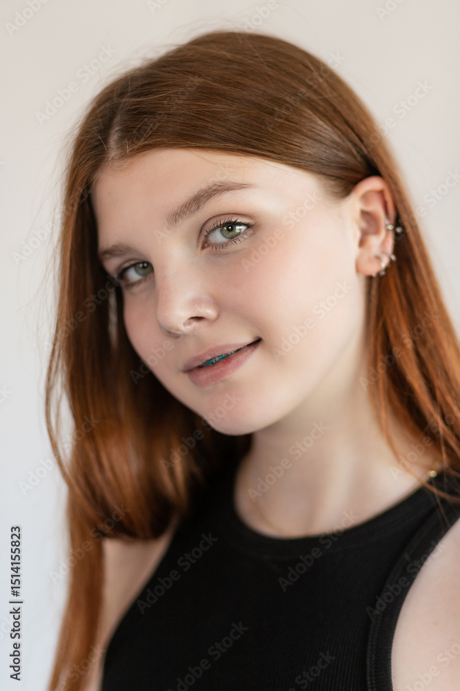 Portrait red-haired girl with freckles and braces Portrait red-haired girl with freckles and braces