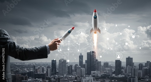 Hand Launching Rockets for Business Success Above Cityscape Photo