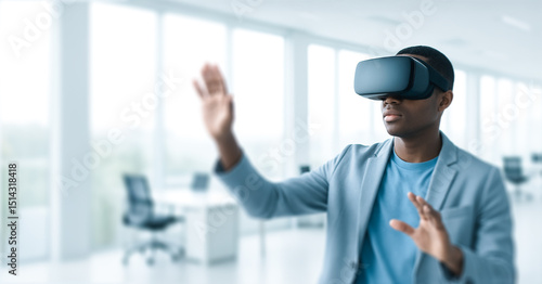 Wallpaper Mural Man wearing a virtual reality headset in a bright modern office space. Torontodigital.ca