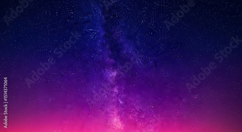 Vibrant purple and pink night sky with milky way