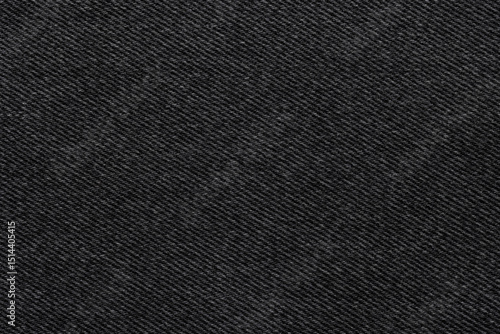 Black denim fabric, for jackets, trousers and other clothes, close-up. Background, texture