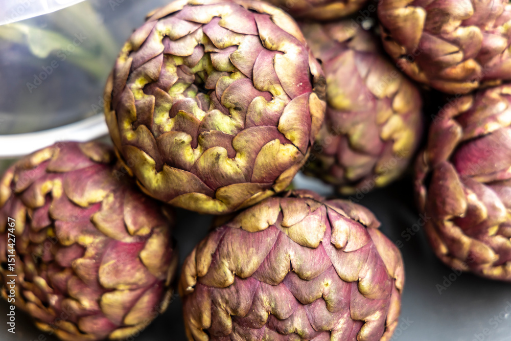 Fototapeta premium Group of artichokes at the market