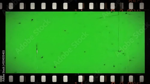 Retro Scratched Film Strip on Green Screen. Vintage Green Film Reel