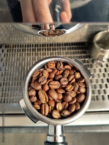coffee beans in a holder on a coffee machine background