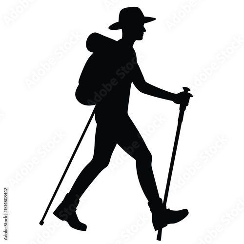 Silhouette of a hiker with backpack and trekking poles exploring the outdoors