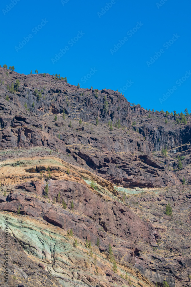 Gran Canaria, Canary Islands, Spain: details of Los Azulejos De Veneguera (Rainbow Rocks), a real geology open air museum along the scenic road from La Aldea de San Nicolas to Mogan. Mountain, erosion Gran Canaria, Canary Islands, Spain: details of Los Azulejos De Veneguera (Rainbow Rocks), a real geology open air museum along the scenic road from La Aldea de San Nicolas to Mogan. Mountain, erosion