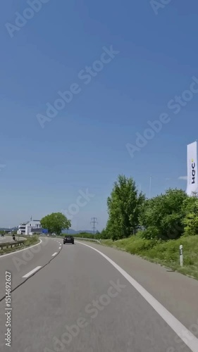 Vertical view of Switzerland road from car