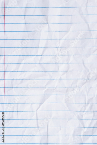 Crumbled lined loose leaf notebook paper background