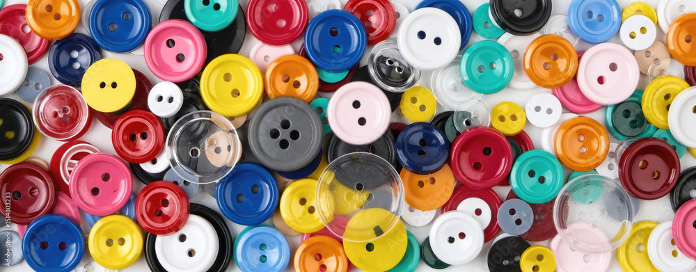 Fototapeta premium Colorful Plastic Buttons Background: Assorted Sewing Supplies
