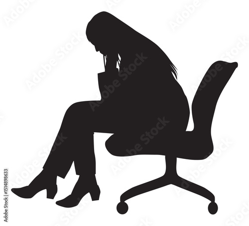 オフィスチェアに座ってうなだれる女性シルエット