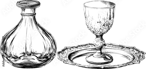 Vintage crystal decanter and glass with ornate tray engraving for elegant decor or design