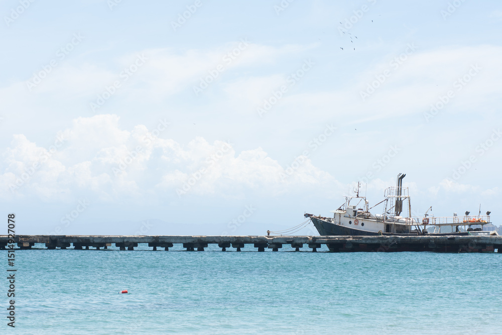 Fototapeta premium Fishing Ship at Pampatar port in Margarita Island, Venezuela