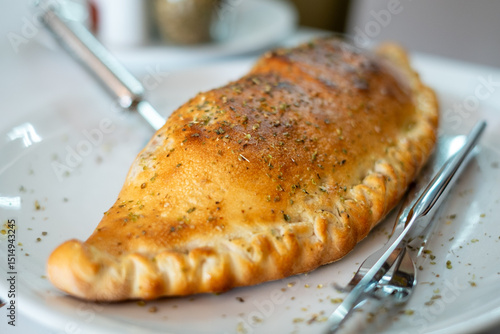 Freshly Baked Calzone on Plate