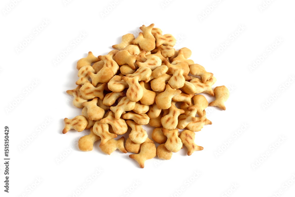 A pile of fish cookies on a white background. A pile of fish cookies on a white background.