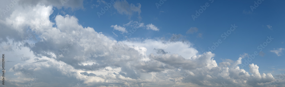heaven sky is blue and cloudy. clouds are white and fluffy. The sky is clear and bright.