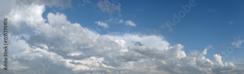 heaven sky is blue and cloudy. clouds are white and fluffy. The sky is clear and bright.