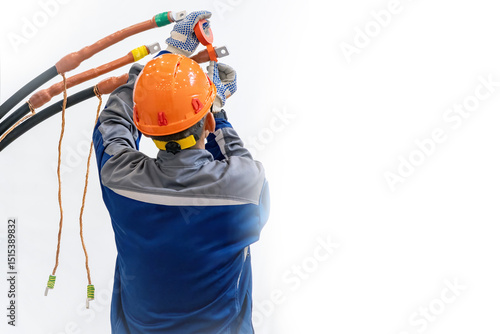Electrician installing high...