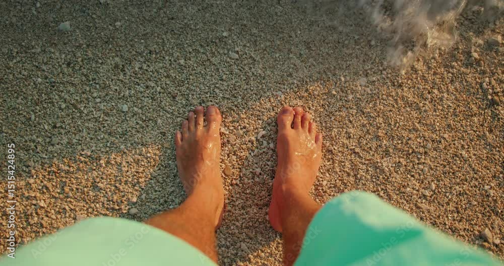 custom made wallpaper toronto digitalBarefoot man standing on calm pebble beach as sea wave approaches at sunset light