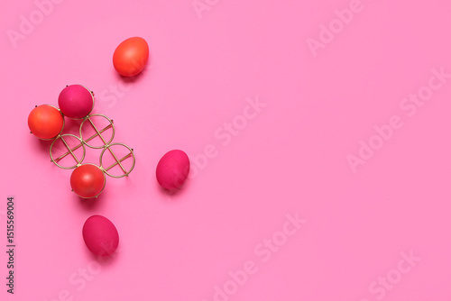 Dyed Easter eggs on pink ba...