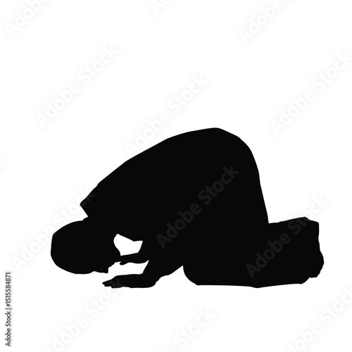 Silhouette of a Muslim man performing prayer, worship or salah