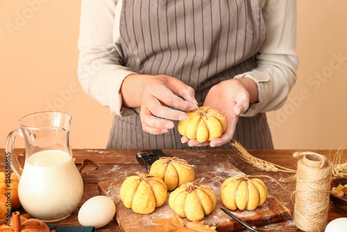 Baker decorating pumpkin-sh...