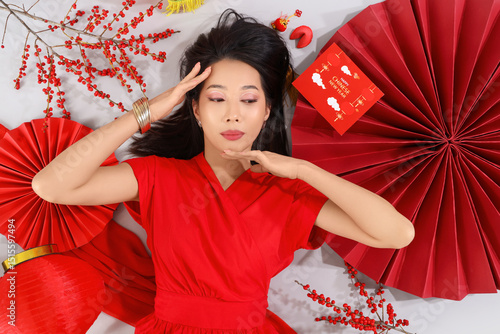 Young Asian woman with chin...