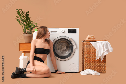 Attractive young woman in u...