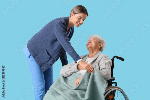 Nurse covering senior woman...