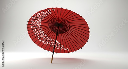 A traditional Japanese umbrella standing upright with rich red and black color tones  centered on a clean white background 